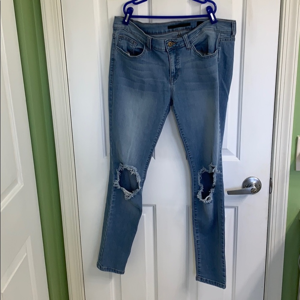 Light wash jeans with ripped knees size 30